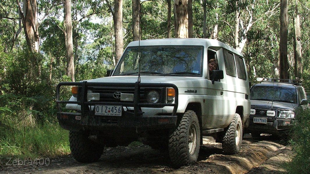 01-Gaby waits in the Troopy while Ryan checks a mud hole.jpg
